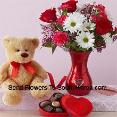 Roses et Gerberas avec un mignon ours en peluche et des chocolats