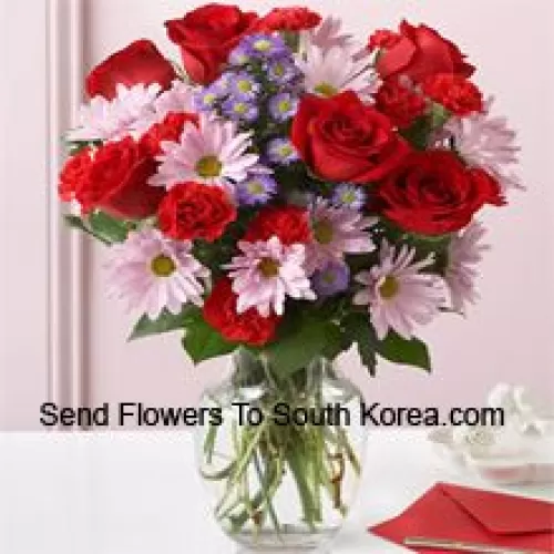 Red Roses, Red Carnations And Pink Gerberas With Seasonal Fillers In A Glass Vase -- 24 Stems And Fillers